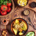 Куриная солянка с колбасой и картофелем с огурцами