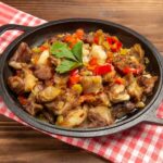 Тушеная капуста со свининой и картошкой в казане