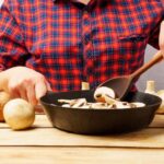 Жареные белые грибы с луком на сковороде