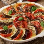 Баклажан с курицей в духовке под сыром и помидорами