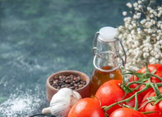 Помидоры с чесноком и перцем на зиму