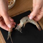 Приготовление мороженных королевских креветок